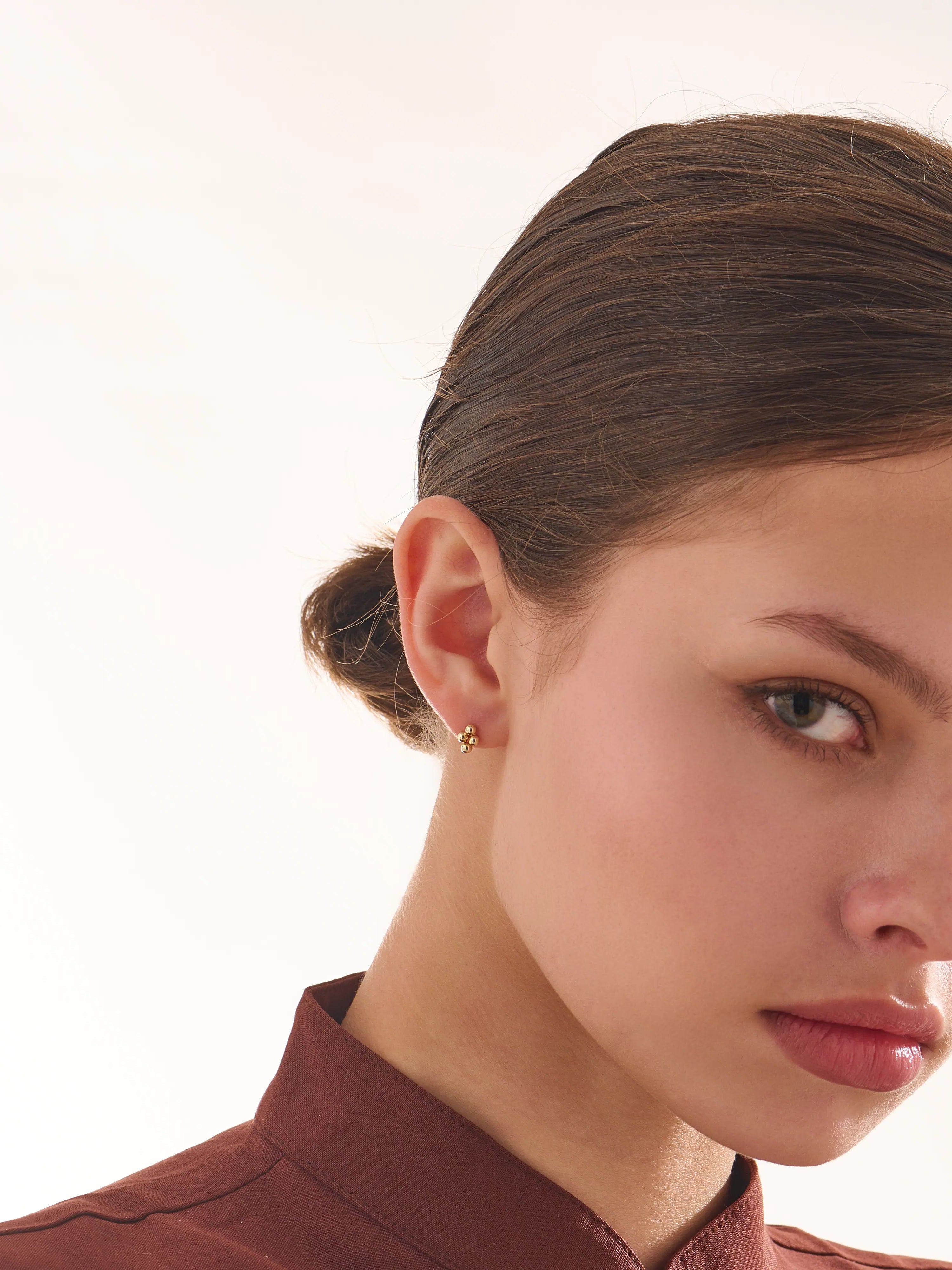 Dot Piercing, solid gold earrings, view 4 | DiaFifth